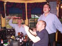 Kevin Robertson leads the singing