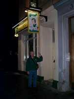 Mike Inglis underneath God outside the Cabbage & Ribs